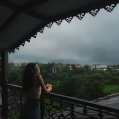 A quiet, moody shot from a balcony on a cloudy day. I love capturing these atmospheric moments that feel like a still from a movie.