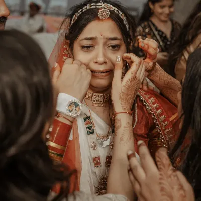 Tears of joy and farewell. We capture the deeply emotional 'Vidaai' moments with sensitivity, preserving the bittersweet beauty of this tradition.