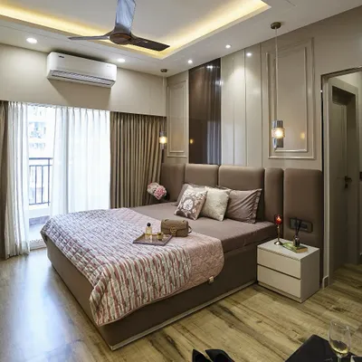 A master suite designed to feel like a five-star escape. I used a combination of wood-look flooring, wall paneling with moulding, and a plush upholstered bed to create a space that is both luxurious and comfortable.