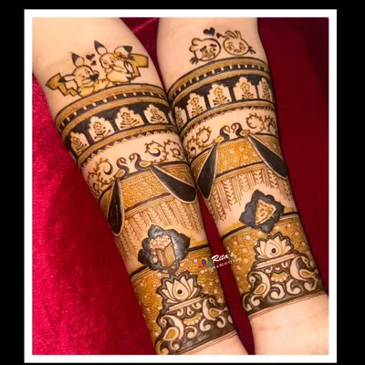 This design was so much fun to create! It features the couple's favorite snacks, popcorn and pizza, along with cute cartoon figures of them on their arms. Your mehendi can truly be about anything you love.