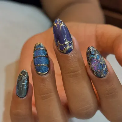 Another look at this incredible jewel-toned set. The mix of textures and deep blue hues is just mesmerizing.