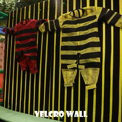 This is our famous velcro wall. Kids put on a special suit, get a running start on the trampoline, and launch themselves to see if they can stick to the wall. It's as fun to watch as it is to do.