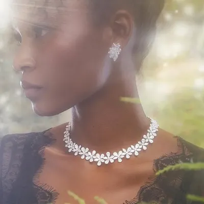 A dreamy, atmospheric shot for Renu Oberoi Luxury Jewellery. We used light flares and a soft focus to create an enchanted forest feel, making the diamond necklace appear magical.
