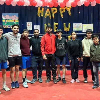 The AKS family celebrating the New Year together at the academy. We believe in building strong bonds off the court as well.