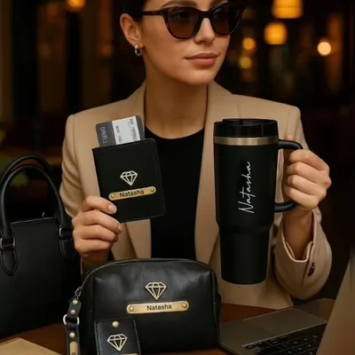 This is the ultimate travel kit for the stylish traveler. The personalized black vegan leather set includes a passport cover, pouch, luggage tag, and a matching tumbler to stay hydrated on the go.