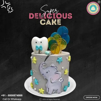 A unique and adorable cake for a little one's celebration. This design features a cute elephant, a tooth character with a bow tie, and colorful lollipops, making it perfect for a first tooth party.