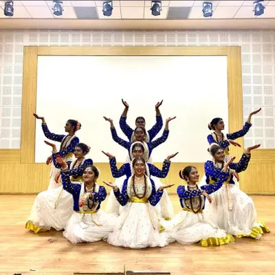 A proud moment! The DPS school dance team looking absolutely stunning in my white and blue classical dance costumes. Their synchronized pose shows how the outfits create a beautiful, unified look on stage.