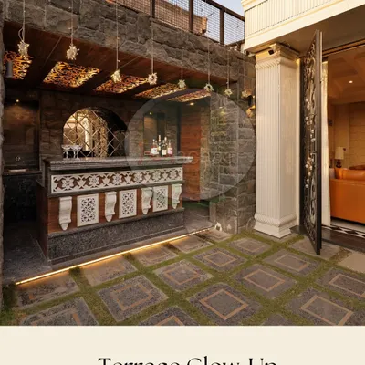 For this project, we designed a custom outdoor bar with an ornate facade and integrated lighting. It’s a permanent, high-impact feature that becomes the centerpiece for entertaining, complemented by stone flooring that has artificial grass growing between the pavers.