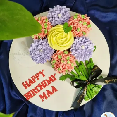 A cupcake bouquet I made for a birthday. I arrange the cupcakes to look like a real bouquet of flowers, with each one piped to look like a different bloom.