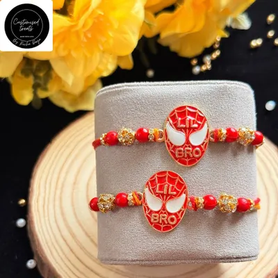 For your 'Lil Bro' who is a superhero in the making. This Spiderman-themed rakhi is sure to be a hit with its iconic mask design and vibrant red color.