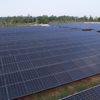 An aerial view of our landmark 1.3 MW solar installation, a project capable of generating approximately 6500 units of clean energy every day. This showcases our capacity to deliver large-scale solar farms that power communities and industries.