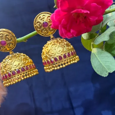Introducing my exclusive traditional jewellery. These beautiful gold jhumkas with ruby details speak of royalty in every detail.