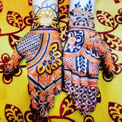 A vibrant and modern design for the hands. The use of bold floral patterns and bright colors in the photo makes this a very eye-catching option for a party.