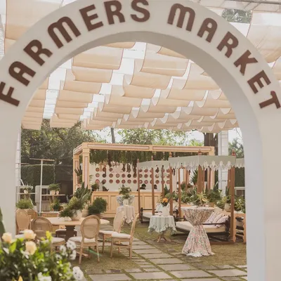 The grand entrance to our 'Farmers Market' brunch, inviting guests into a rustic and charming world of fresh food and relaxed fun.