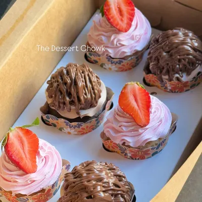 An assorted box of six cupcakes, featuring a mix of my Strawberry Fresh Cream and Nutella Mousse flavors. It's the perfect way to sample two of my most popular cupcake varieties.