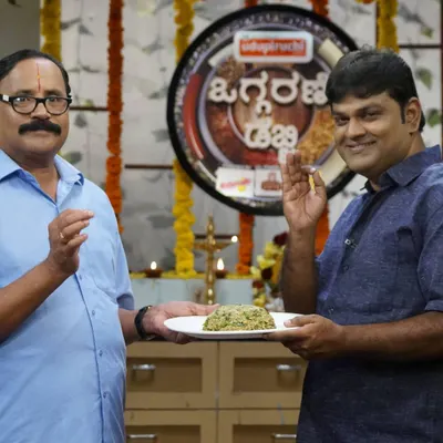 My father on the set of the television show 'Oggarane Dabbi', presenting one of his signature dishes. It was a proud moment for us to share our traditional recipes with so many people.