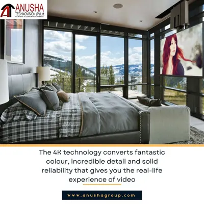 This bedroom installation features a ceiling-mounted, retractable 4K projector screen, providing a full cinematic experience without compromising the room's design. It's a perfect example of how I integrate advanced AV technology into personal living spaces.