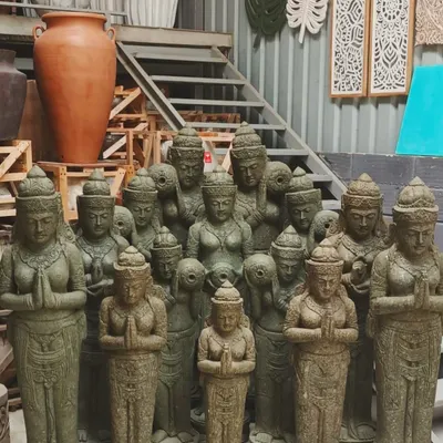 An army of art. This photo shows a group of our standing Balinese doll statues, each handcrafted and waiting to bring a sense of peace and grace to a new home.