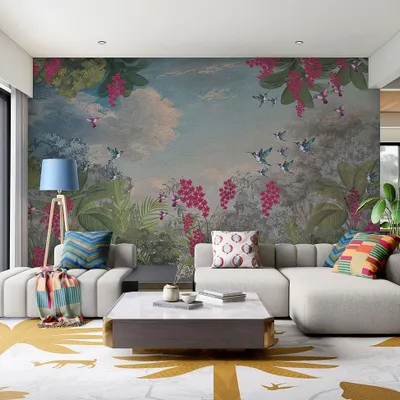 This vibrant, painterly mural of a sky with birds and flowers turns a living room wall into a stunning piece of art. It's a bold choice that brings energy and color into the home.