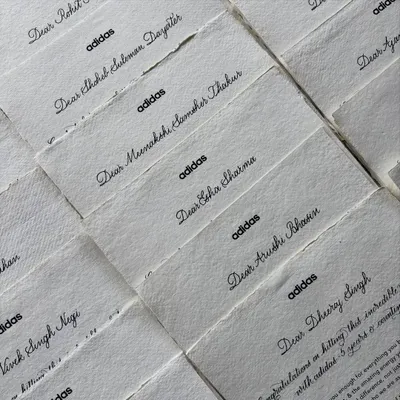 For this project with Adidas India, I addressed over 75 appreciation notes by hand. The combination of a typed message with digital and handwritten calligraphy on textured paper creates a beautiful and heartfelt keepsake.