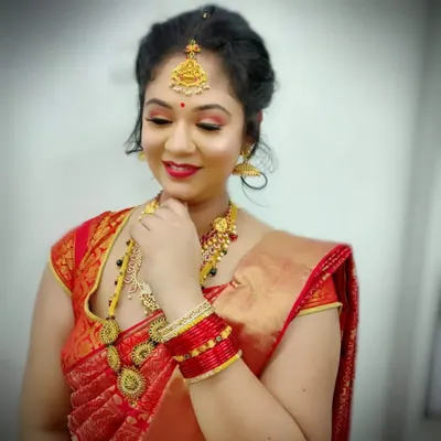 A complete South Indian bridal look created by our students. Our makeup courses teach you to master traditional looks, including flawless base application, eye makeup, and accessorizing.
