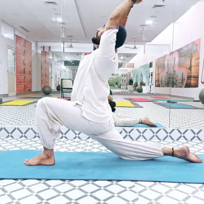 The Equestrian Pose (Ashwa Sanchalanasana) is a powerful lunge that strengthens the legs, stretches the hips, and improves balance. It's also therapeutic for relieving sciatica pain.