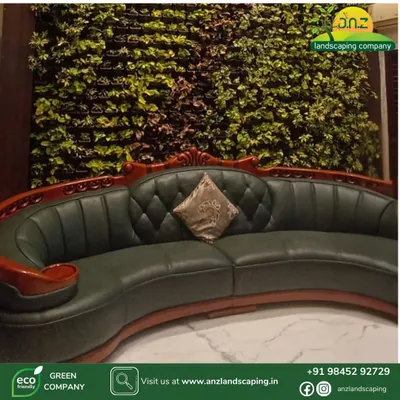 This view shows how our indoor living wall complements classic, luxurious furniture. The rich green foliage provides a natural, textured backdrop that enhances the elegance of the room's interior design.