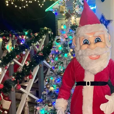 Our Santa Claus mascot bringing Christmas cheer to a beautifully decorated home. This is perfect for surprise visits and family gatherings during the holiday season in Mumbai.