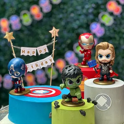 For the little superhero in your life, this Avengers-themed cake setup is always a hit. I created three separate eggless cakes, each representing a different hero, and topped them with high-quality figurines to bring the action to the party. This multi-cake display makes a big impact at kids' birthday parties.