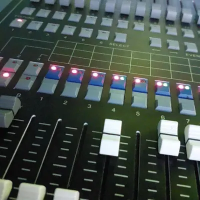 A close-up of the mixing board. I use professional-grade equipment to ensure the sound quality is crisp and the transitions are seamless, which is crucial for any successful event.