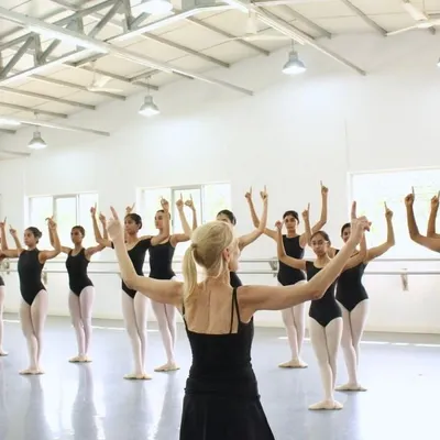 Our Artistic Director, Yana Lewis, leads the National Youth Ballet in learning new choreography. Every piece begins here, with meticulous instruction and attention to detail.