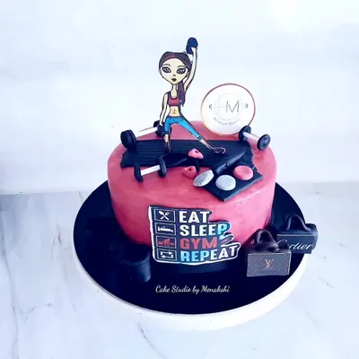 A fun cake for the girl who loves to gym and shop. This design features a caricature, gym equipment, and luxury shopping bags, capturing her favorite things.