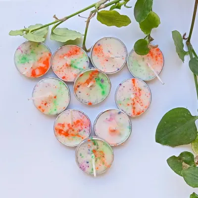 My "Colors of Joy" collection for Holi. These peach-scented soy wax tealights are sprinkled with vibrant, skin-safe colors to celebrate the festival in an eco-friendly way.