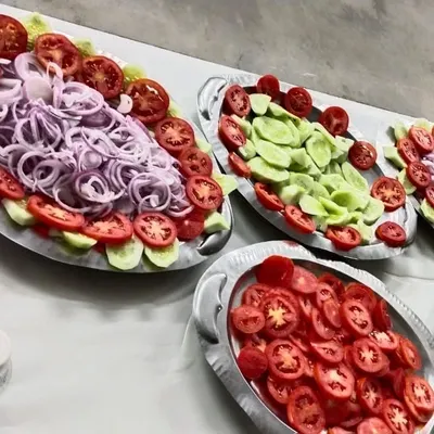 A fresh salad is a must with rich Indian food. We provide beautifully arranged platters of sliced cucumbers, tomatoes, and onions for your buffet.