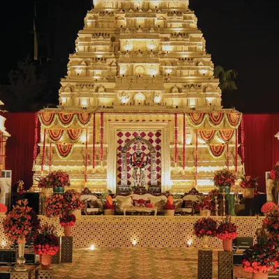 The centerpiece of our Mysore Mandira project: a breathtaking recreation of a South Indian temple facade, serving as a divine mandap. This structure was the culmination of immense craftsmanship, designed to be a sanctum of devotion and grandeur.