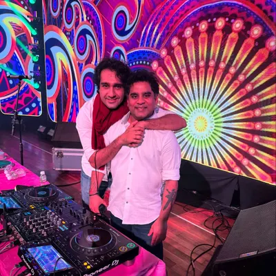 Our team is a family of sound. This is me with my percussionist, my partner in creating the high energy vibe at every show. We work together to make every performance unforgettable.