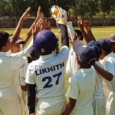 A team huddle full of energy and celebration during the Christmas Cup U-12. This is the spirit we foster in all our teams.