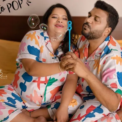 Fun and playful moments in matching pajamas! This at-home session was all about capturing the couple's fun-loving personalities as they get "ready to pop".