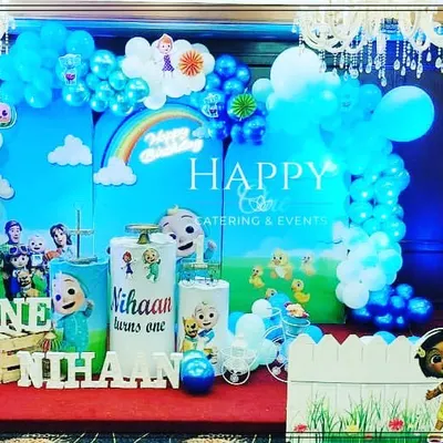 A vibrant Cocomelon theme, perfect for a first birthday. This setup includes a full backdrop, character cutouts, and coordinated balloon decorations to bring the popular show to life.