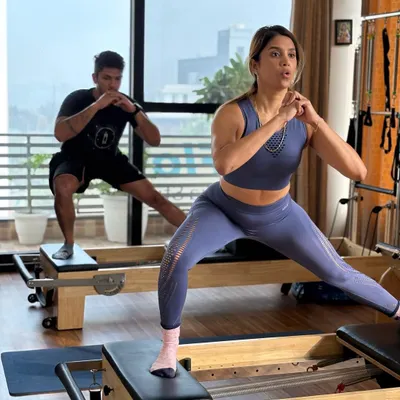 A powerful demonstration of a reformer side lunge, a fantastic exercise for targeting the glutes and inner thighs while challenging balance.