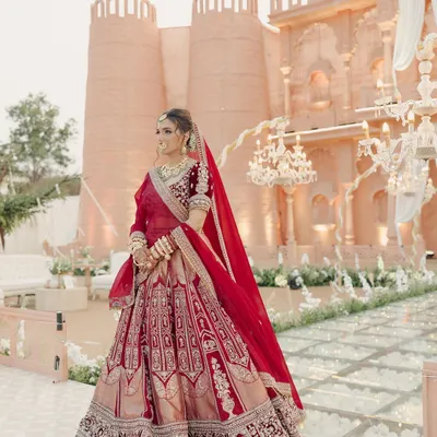Janvi was the picture of regal grace on her wedding day. Her classic red lehenga called for a makeup look that was both timeless and radiant, enhancing her features without overpowering her magnificent bridal attire.