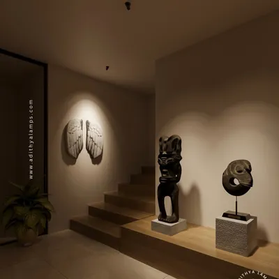 Our 'Deep' downlights are used here to create a dramatic gallery effect in a residential hallway. They precisely spotlight sculptures and wall art, turning a simple corridor into a personal art exhibition.