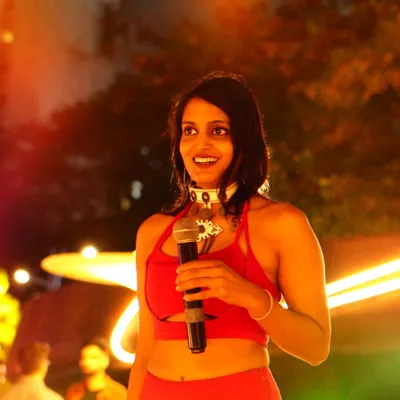 This is a close-up from an outdoor event with a great party atmosphere. My goal is to connect with every person in the audience, making sure the energy stays high from start to finish.