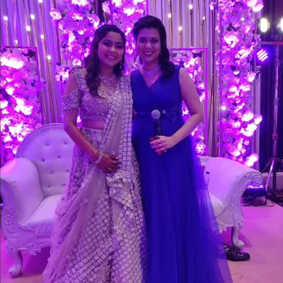 Sharing a happy moment with the bride-to-be. Building a friendly connection with the couple and their families is a key part of my hosting style as your "dost".