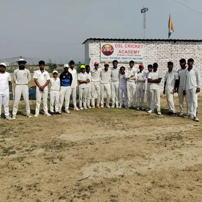 Our squad of players standing together in front of the DSL Cricket Academy. We are proud of the dedication and hard work these young athletes bring to the ground every single day.