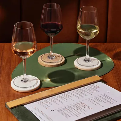 This is the core of our wine philosophy. A selection of red, white, and rosé, ready to be poured by the glass, inviting you to explore pairings and find a new favorite without ordering the bottle.