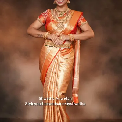 A complete bridal look created for a portfolio shoot. The golden Kanjivaram saree is perfectly pleated, complemented by traditional temple jewelry and a radiant makeup look.