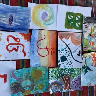 The beautiful results of our art therapy session. Each painting is a unique expression of the artist's inner world, a colorful manifestation of their emotions and creativity.