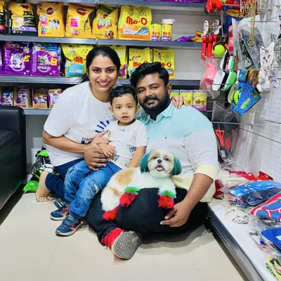 Happy Holi from my family to yours. My store is more than just a business, it's a community. Here we are celebrating in the shop, surrounded by all the pet supplies and treats that I've handpicked for your furry family members.