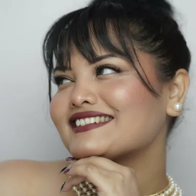 Self-grooming is about feeling good and letting your best self shine. A classic updo, a bold lip, and perfectly done nails are my favorite ways to invest in my own self-worth.